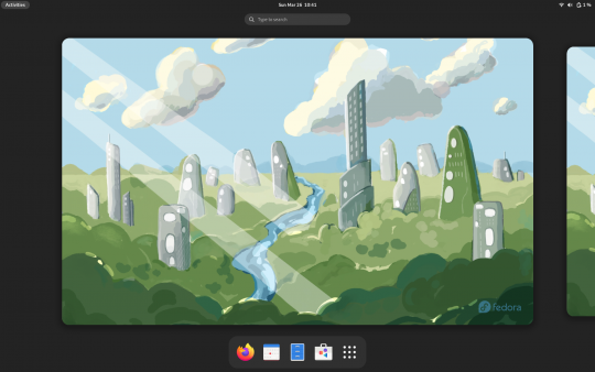 initial launch screen for Fedora 37 with a cartoonish background showing clouds a light blue sky, green ground with a small river flowing down the middle and large rock like formations or buildings jutting into the sky. Rays of light shine down from the top left corner diagonally towards the center bottom